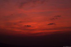 Sky with reddish hues after sunset