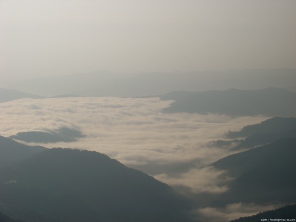 Sea of clouds covering the valleys