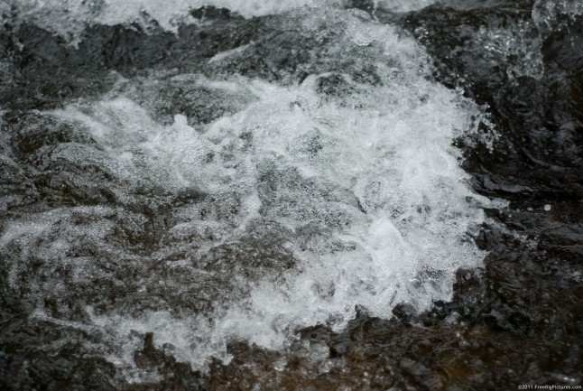 Water swirling continuosly in the river bed